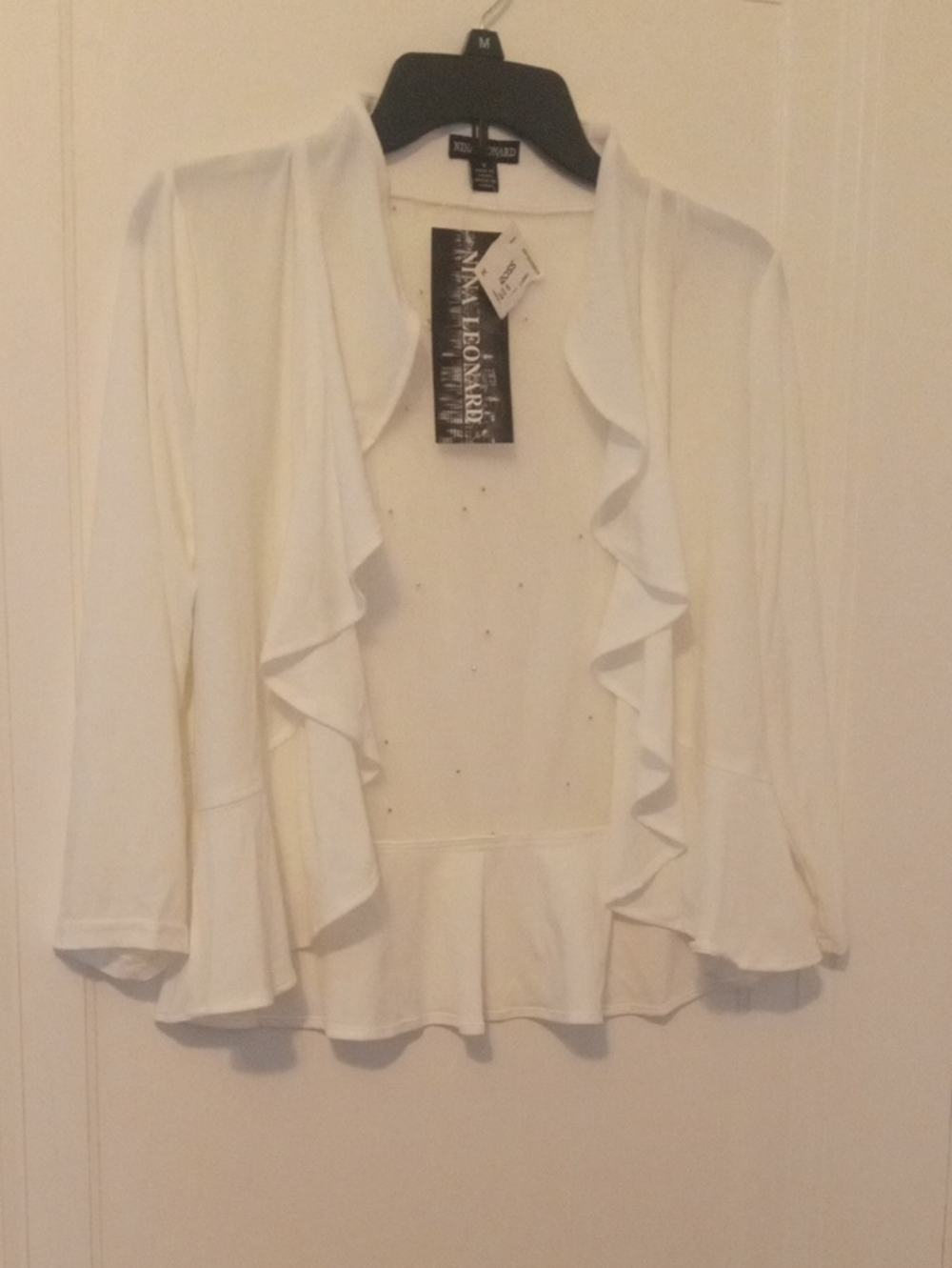 NWT women small white open front top, back is sheer with pearl accents